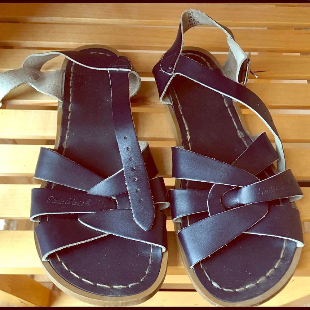 Navy saltwater sandals lightly worn